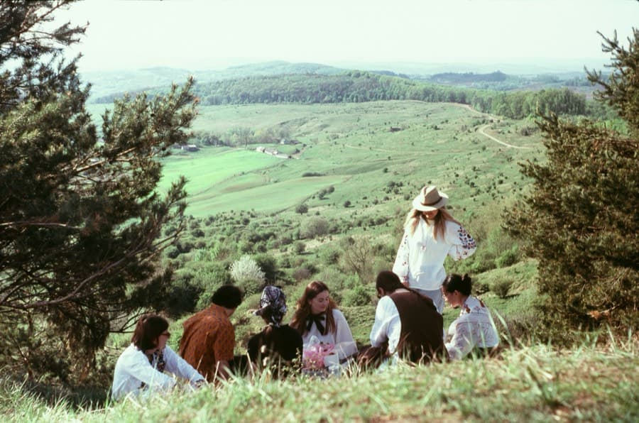 A group on a grassy hillside